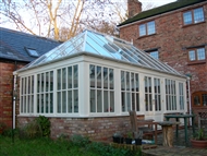 Hardwood Conservatory glass hip roof with georgean windows